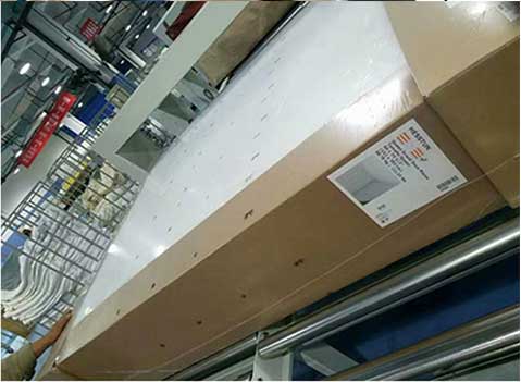 Bọc màng co hộp carton bằng máy VNP-13030
